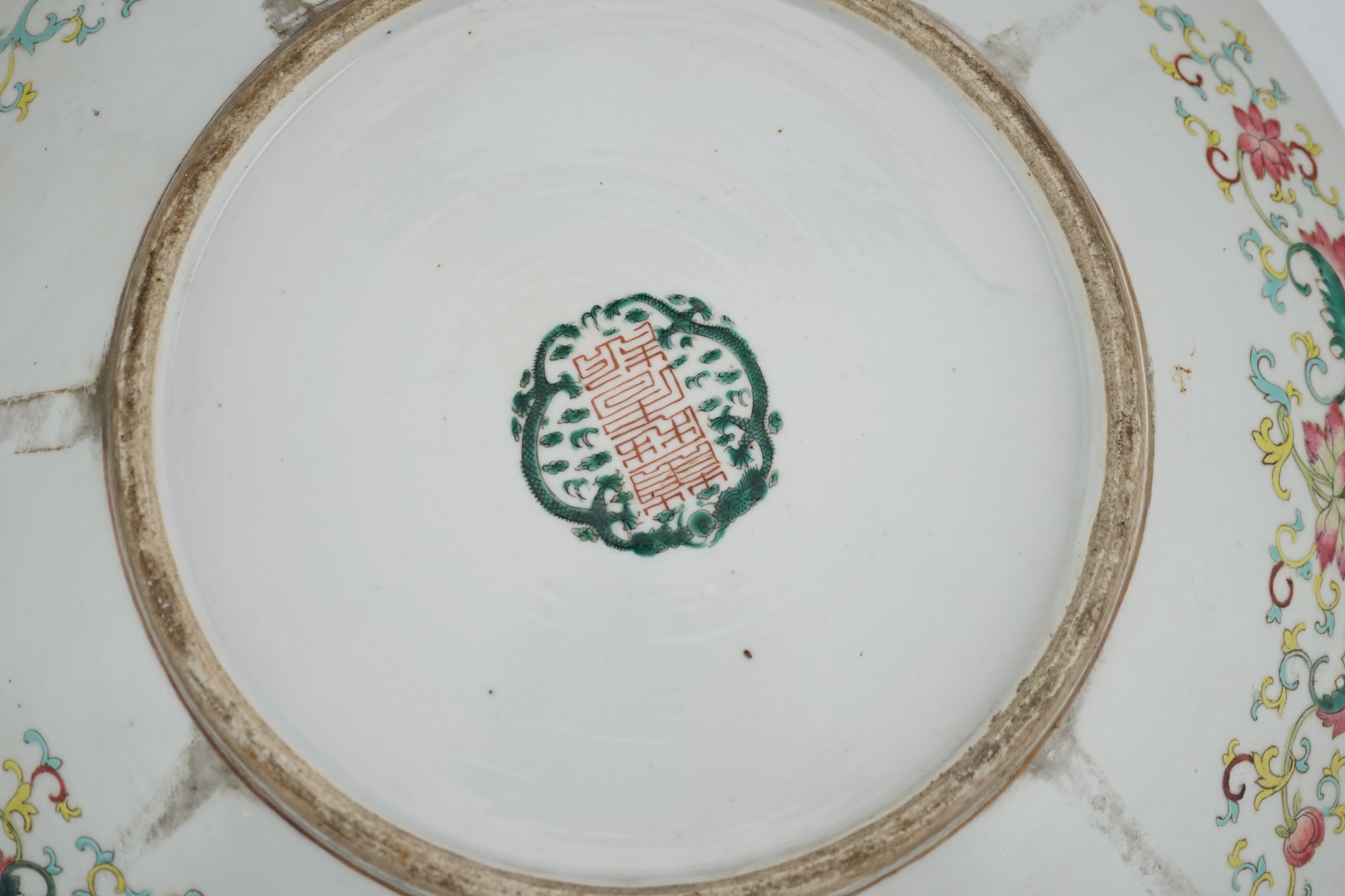 A Chinese yellow ground ‘dragon’ dish, late 19th century, minor damage
